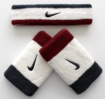 Conjunto de diadema y pulseras Nike para adultos vela/equipo oscuro rojo/antracita Foto 1 de 2