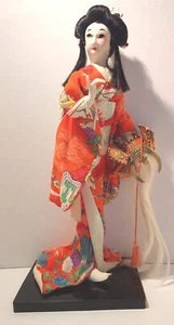 Vintage Geisha Doll Figurine with Head Piece Red Fabric Dress on Wooden Base. - Picture 1 of 3