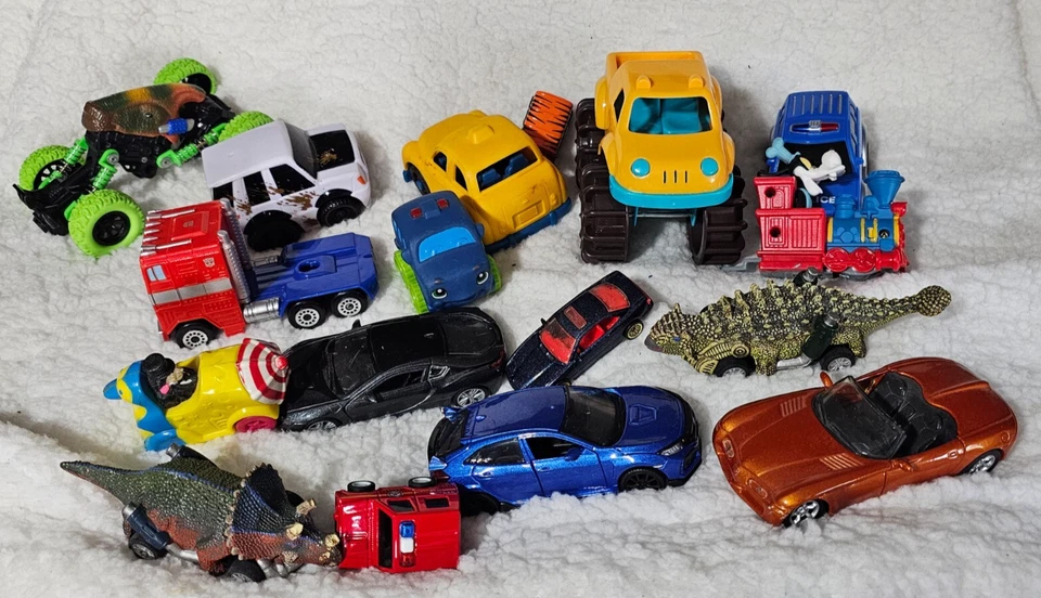 (Lot of 17) Boys Toys Cars Optimus Prime Penguin Dinosaurs Goofy Train etc. - Image 1 of 4