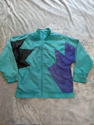 Chaqueta cortavientos geométrica vintage años 90 Coliseo Jockey verde azulado y púrpura - pequeña Foto 1 de 4