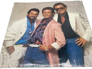 larry gatlin & the gatlin brothers smile vinyl record lp 1985 cbs inc READ - Foto 1 di 4
