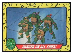 1989 Topps Teenage Mutant Ninja Turtles #77 Pericolo su tutti i lati! - - Foto 1 di 2