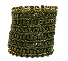 Bracelet with a variety of chains in gold and black tones