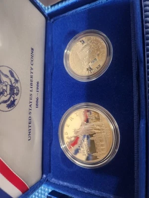 1986 Liberty Coins Proof Silver Dollar and CN Half Dollar UNC In OGP - Image 1 of 4