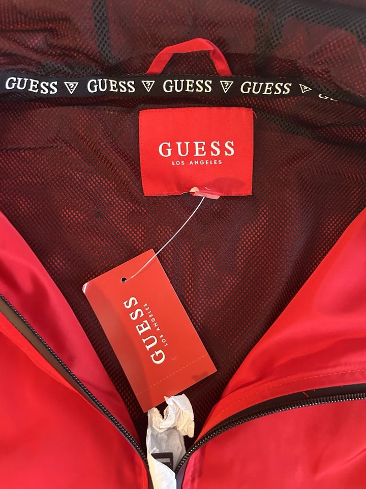 Chaqueta cortavientos Guess para hombre suéter con capucha media cremallera roja blanca talla L Foto 1 de 4