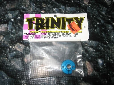 Trinity 1:12 Left Side Clamping Hub Fits Stealth Wheels Aluminum Blue (1) TM1208 - Image 1 of 2