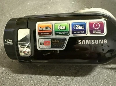 Videocámara digital y cargador Samsung SMX-F33BN/XAA Foto 1 de 2