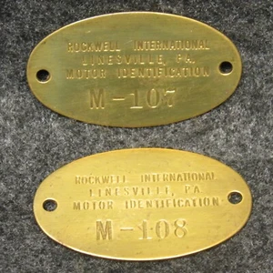 2 Rockwell International Linesville PA Motor ID Brass Tag Fobs M-107 M-108 2" - Picture 1 of 2