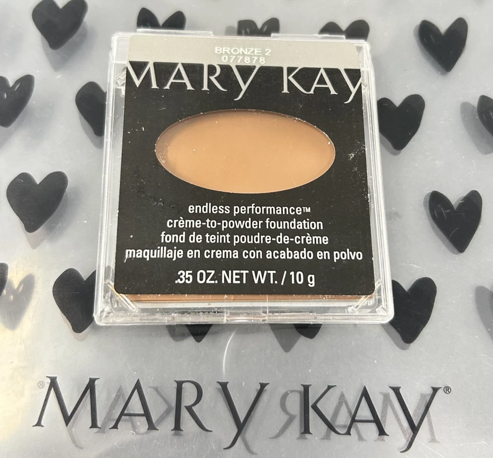 Base de maquillaje Mary Kay crema a polvo bronce 2 NOS rendimiento infinito 077878 RARA Foto 1 de 1