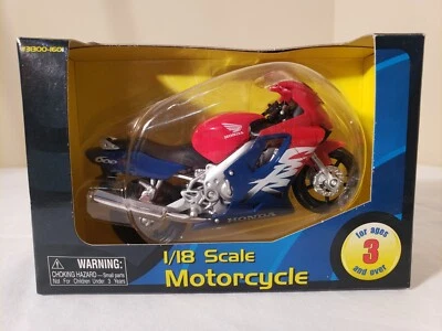 Honda CBR600F 1999 motocicleta roja/blanca/azul escala 1/18 diecast nueva en caja Foto 1 de 4