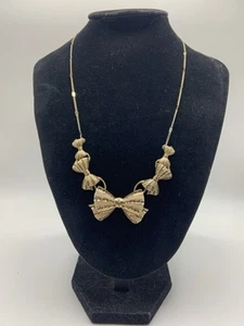 "Collar llamativo con lazo crema esmaltado de colección tono dorado 16""" - Imagen 1 de 18