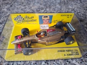 Minichamps F1 1/43 JORDAN PEUGEOT 196 GOLD RALF SCHUMACHER Test Car RSC No.1 - Picture 1 of 3