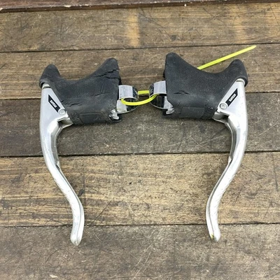 Par de palancas de freno de barra abatible para bicicleta de carretera Suntour de colección 23,8-24,2 mm capós negros Foto 1 de 4