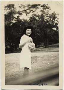 June BUSTS OUT in GRIMACE SMILE CLUTCHING PURSE ALMOST MASK-like FACE - Bild 1 von 1