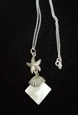 Antiguo collar artesanal de estrellas de mar de plata, madreperla. Náutica, océano. Foto 1 de 3