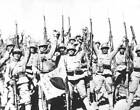 Japanese troops raise their arms rifles celebration their military- Old Photo