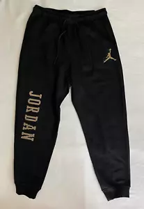 Nike Jordan Essentials Gold Logo Men's Size L Black Fleece Sweatpants FD7467-011 - Picture 1 of 8