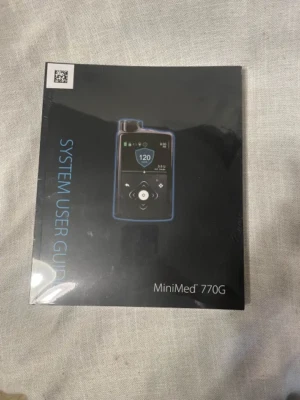 Guía del usuario del sistema Medtronic Mini Med 770G | Nuevo en envoltura retráctil Foto 1 de 2