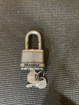 Master Lock Magnum Padlock Laminated Steel w/ 1 Key 1-3/4" Wide 1-1/2" Tall - Image 1 of 3
