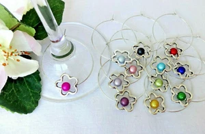 12x Glasmarkierer Glasmarker Blumen Katzenauge Bunt Perle Anhänger Deko Party - Bild 1 von 2