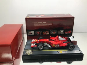1:18 Ferrari F248 M. Schumacher 2006 Shanghai GP Hotwheels F1 J2995 L.E. OVP - Picture 1 of 3