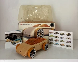 Nuevo en caja Manhattan Toy Euro Ltd Nuevo en caja Automoblox C9-S Naranja Calello Coche deportivo de madera - Imagen 1 de 12