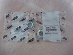 Mazda NEW OEM Axle nuts (2). D651 33 042A - Picture 1 of 4