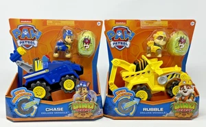 Paw Patrol Dino Rescue RUBBLE & Chase Deluxe REV UP Fahrzeug + Mystery Dinosaurier - Bild 1 von 11