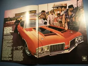 1970 Oldsmobile Olds 4-4-2 442 2p mid-size-mag car ad - Dr. Olds & gang at track - Picture 1 of 1