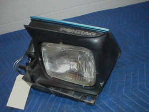 1985-90 FIREBIRD TRANS AM GTA POWER HEADLIGHT + MOTOR POPUP ASSY. LEFT DRIVER - Picture 1 of 7