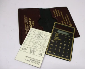 Vintage Ultra Think 2mm Solar Pocket Calculator Pacific Northwest Bell Holder - Picture 1 of 4