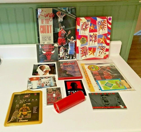 Michael Jordan Miscellaneous lot (book, DVD, cologne stickers, postcard, pogs) Cover