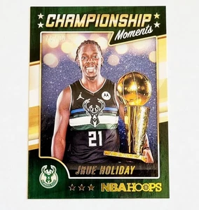 JRUE HOLIDAY 2021-22 AROS CAMINO A LA FINAL CAMPEONATO MOMENTOS #'D/99!!!! - Imagen 1 de 1