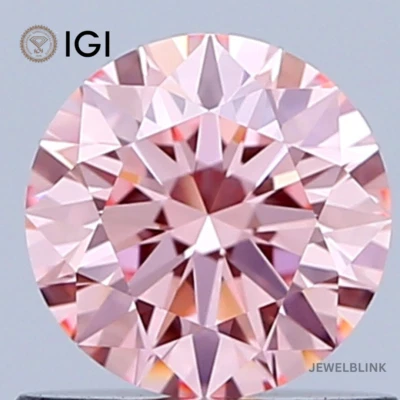IGI Certified 0.68 Carat Fancy Vivid Pink VVS1 Round Cut CVD Lab Grown Diamond - Image 1 of 4