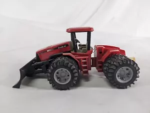 Case IH Stx 500 Tractor With Plow (1:64 farm toy) RC2 Brands 2004 - Picture 1 of 5