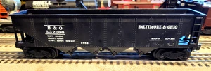 LIONEL PREWAR 2956 DIE CAST QUAD HOPPER WITH POSTWAR TRUCKS IN GOOD CONDITION. - Picture 1 of 4