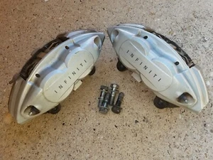 2008 TO 2019 INFINITI FX50 G37 M37 M56 Q50 Q60 Q70 AKEBONO FRONT BRAKE CALIPERS - Picture 1 of 18