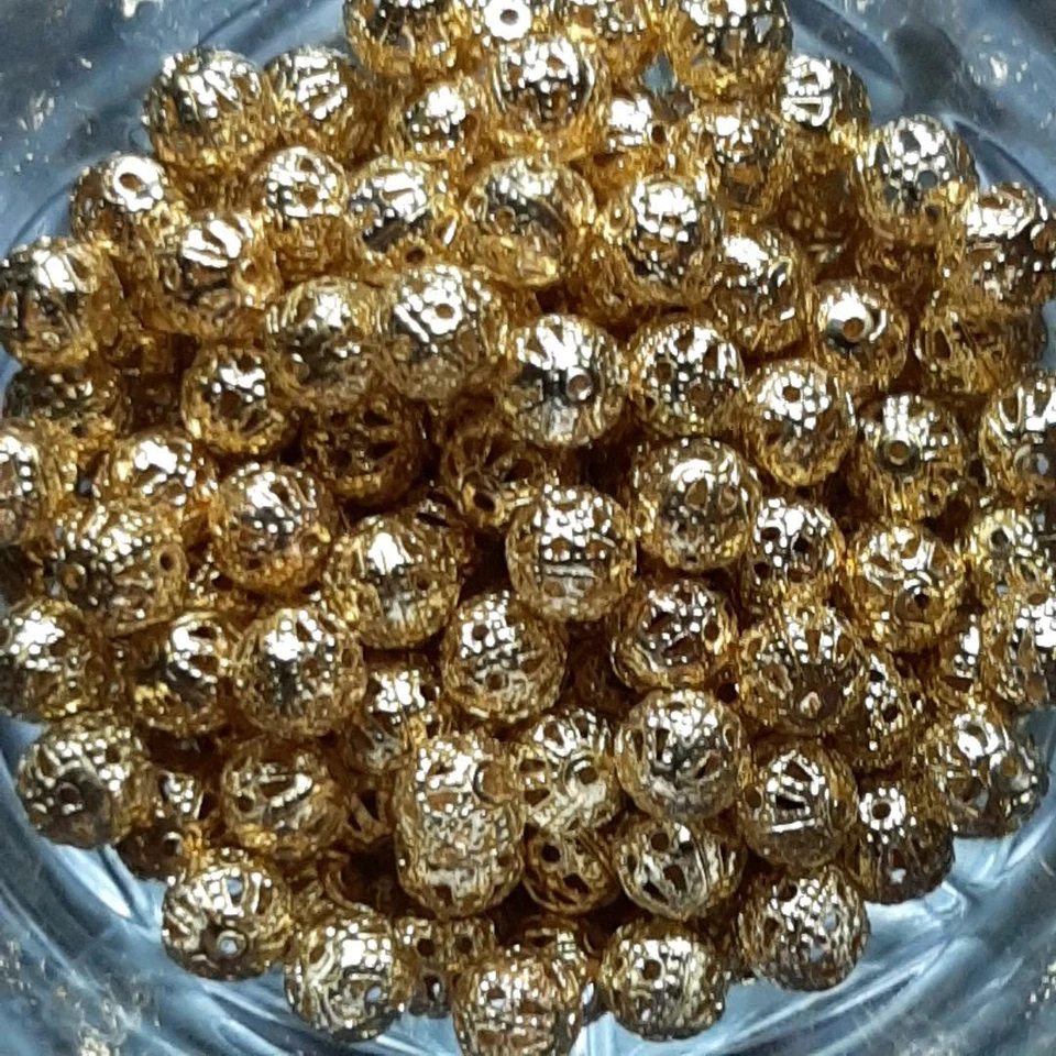 Contas redondas ocas de filigrana folheadas a ouro 6 mm (100)  - Imagem 1 de 1