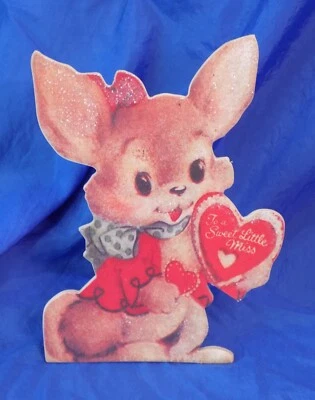 Tarjeta retro de pie de San Valentín con conejito y corazón Foto 1 de 3