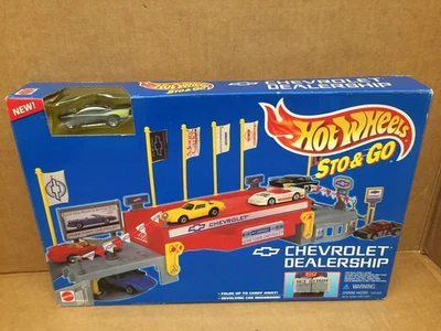 VINTAGE 1995 HOT WHEELS CHEVROLET CAR DEALERSHIP MINT IN SEALED BOX 57 CHEVY - Image 1 of 4