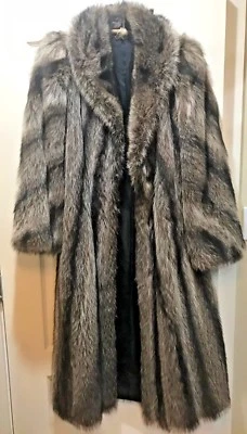 WOMAN'S FULL LENGTH RACCOON COAT & HAT - Image 1 of 4