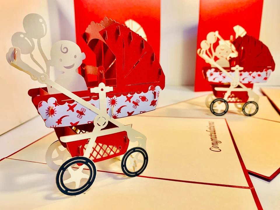 Tarjetas Pop Origami Cochecito Metálico Cochecito de Bebé en Rojo Recién Nacido Bebé 3D Tarjeta Pop Up Foto 1 de 4