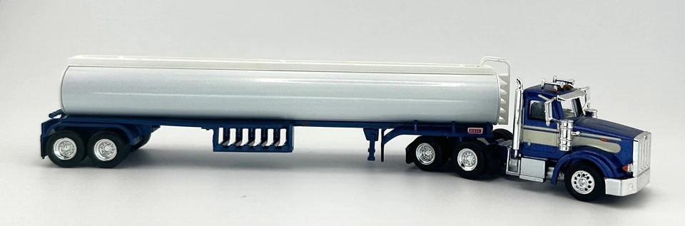 HO 1:87 TNS 515093 - Peterbilt 367 cabina corta con cisterna de gasolina - AZUL/BLANCO Foto 1 de 1
