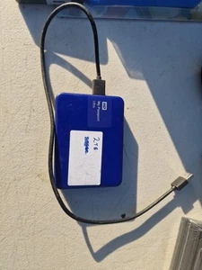 Disque dur externe WD My Passport Ultra 2 To - Photo 1/2