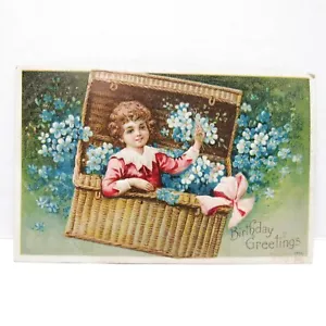 AK Vintage gestempelt 1910 Geburtstagsgrüße Mädchen im Korb Blumen Jubel - Bild 1 von 2