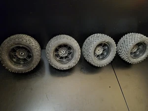 Vintage Traxxas Sporttraxx 5.75x3.5-3.2 1/8 Truck Tires Wheel 14mm 3 TIRE 4 RIM - Picture 1 of 4