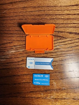512 MB SanDisk Memory Stick Pro Duo card + SanDisk Memory Stick Adaptor +  case - Image 1 of 2