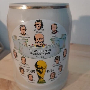 0,5l Bierkrug WM 1974 Deutschland Steingut, zum Int.Wandertag Ruppertszell 1983 - Bild 1 von 4