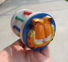 Vintage PAWS Garfield Cat Dog Baby Toy Rolling Jingle Bell