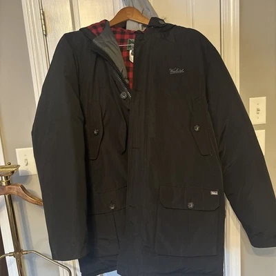 Abrigo de plumón de piel de coyote Woolrich XL usado XL chaqueta negra para hombre Foto 1 de 4